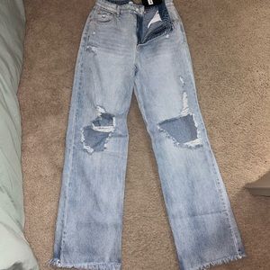 Light wash high rise blue jeans